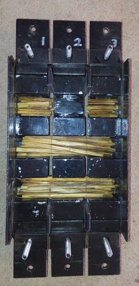 This is a photo showing the top view of the holding tray after cutting with top plates removed.