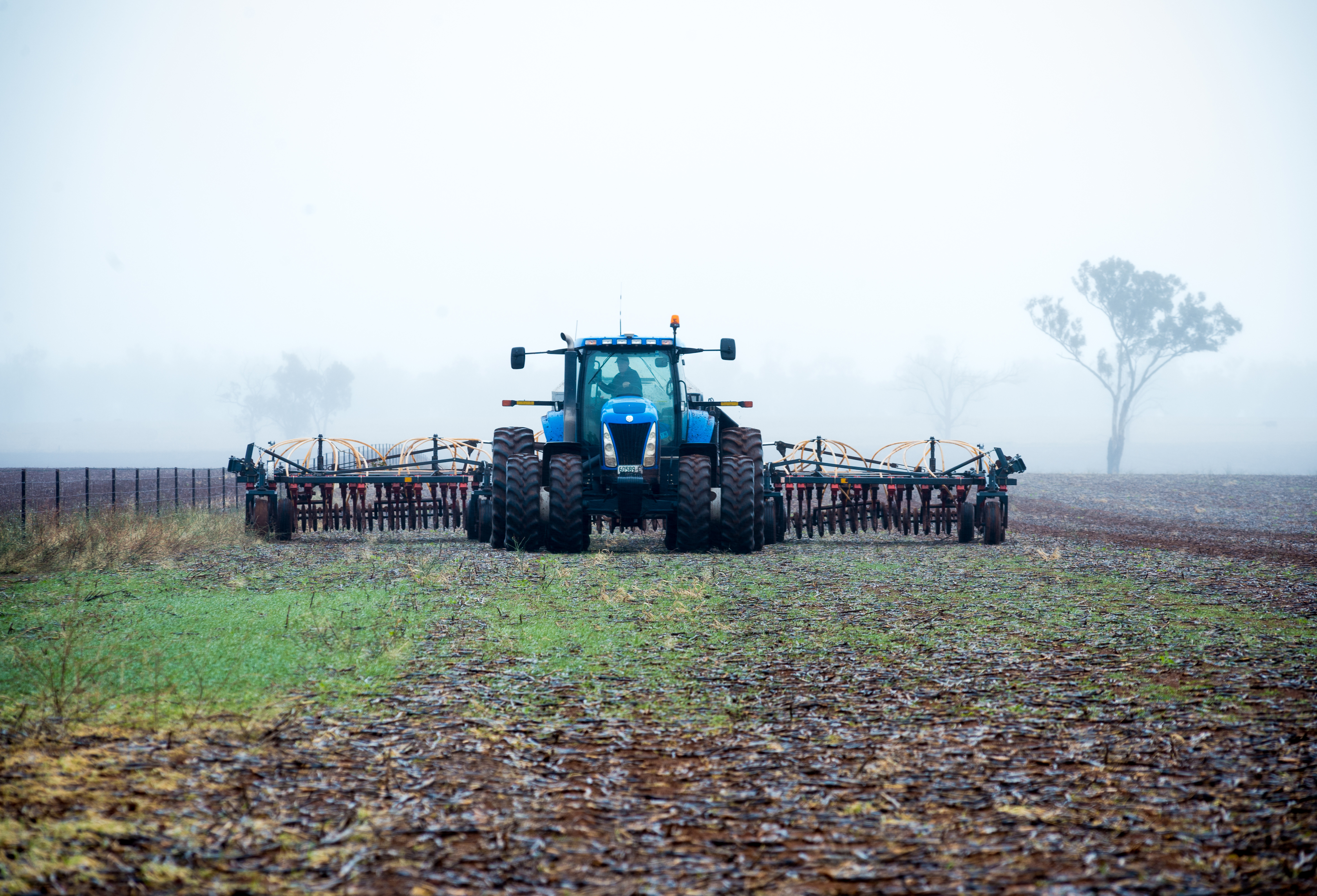 Tractor in a wet paddock
